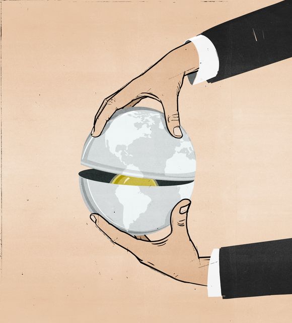 Hands Opening the Globe Capsule